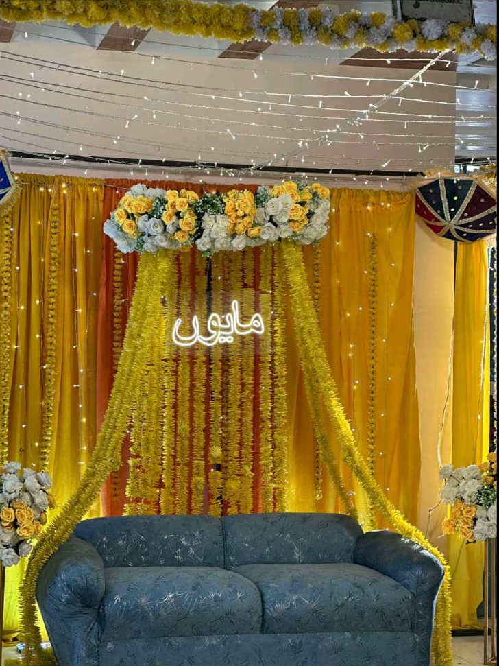 Nikah stage with yellow drapes